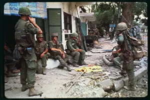 US Marines Standing on Hue Streets