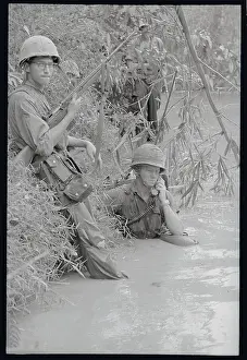 US Marines Wading Trough River