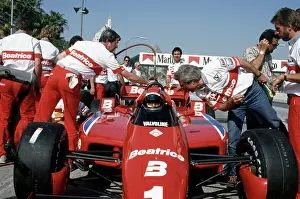 Prints of LONG BEACH, CALIFORNIA - APRIL 13 : Racer Mario Andretti (1) driving a Newman/Haas Beatrice Lola T-900 C at the Toyota Long Beach Grand Prix race, April 13, 1985 in Long Beach, California Legends of the Track: Mario Andretti at Toyota Long Beach Grand Prix Race 1985