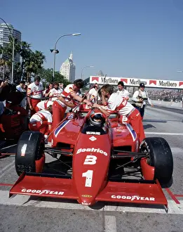 Prints of LONG BEACH, CALIFORNIA - APRIL 13 : Racer Mario Andretti (1) driving a Newman/Haas Beatrice Lola T-900 C at the Toyota Long Beach Grand Prix race, April 13, 1985 in Long Beach, California Legends of the Track: Mario Andretti at Toyota Long Beach Grand Prix Race 1985