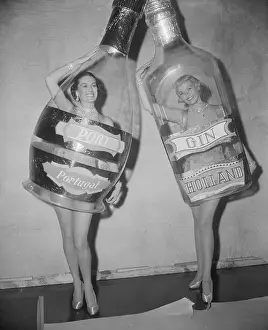 Marion Ross and Joan Corbett Wearing Plastic Bottle Costumes