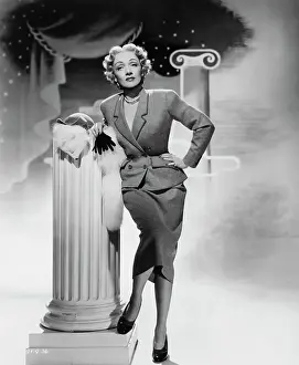 Marlene Dietrich Leans Against Column