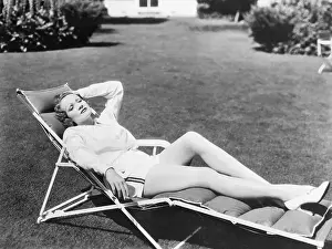 Sunbathing Prints: Marlene Dietrich Relaxing in a Lawn Chair