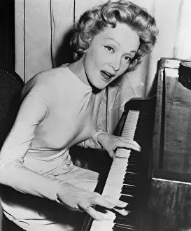 Marlene Dietrich Singing, Seated At Pian