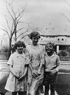 Prints of Marlon Brando at age six, standing next to his two sisters The Iconic Moments Captured: Marlon Brando