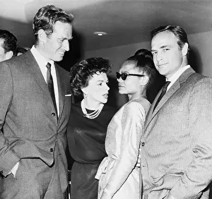 Prints of (Original Caption) 8/8/1963-Hollywood Captivating Art Prints Celebrating the Iconic Performer’s Legacy: Marlon Brando, Eartha Kitt, Judy Garland and Charlton Heston