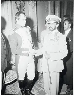 Prints of (Original Caption). Emperor Haile Selassie (right) of Ethiopia visited the 20th Century Fox Studios in Hollywood and was greeted by the Emperor Napoleon as portrayed by actor Marlon Brando The Iconic Moments Captured: Marlon Brando and Emperor Haille Selassie