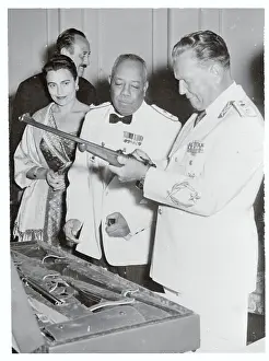 Marshal Tito and Ibrahim Abboud Examining Gun