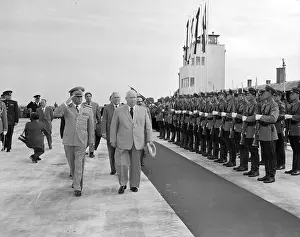 Marshal Tito, Nikita Krushchev and Nicolai Bulganin Walking Past Honor Guard