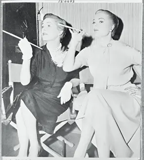 Martha Hyer and Laura La Plan Te Smoking on Set