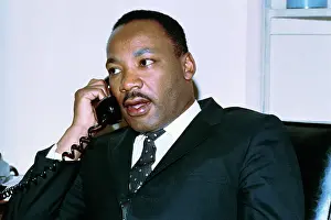Martin L. King Jr. Conversing by Telephone