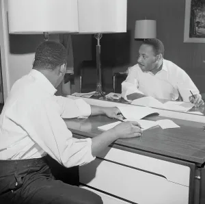 Equality Prints: Martin Luther King Sitting at a Hotel Desk