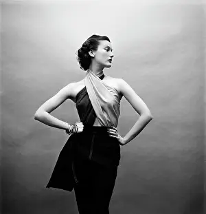 Prints of NEW YORK CITY, NEW YORK - 1951 : Fashion model Mary Jane Russell stands with her face to the right with her hands on her hips and wearing tank top and black pants. (Photo by Tony Vaccaro/Getty Images) Hollywood's Sultry Siren – A Photographic Tribute: Mary Jane Russell