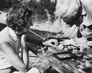 Digging Prints: Mary and Louis Leakey Studying Skull Fragments
