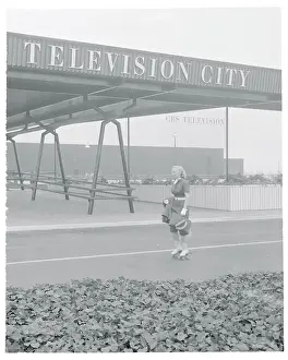 Mary Markham Roller Skating to Work