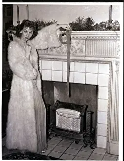 Comedienne Prints: Mary Martin Holding Up Stocking