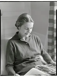 Mary McCarthy Reading a Magazine