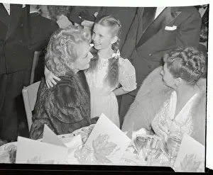 Mary Pickford and Child Embracing