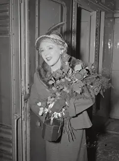 Penn Station: Echoes of Transit: Mary Pickford Holding Bouquet of Flowers