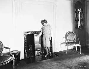 Mary Pickford Standing at Fireplace