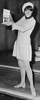 Beret Prints: Mary Quant in Miniskirt and Holding her O.B.E