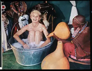 Kenya Prints: Masai Tribeswoman Helping Carroll Baker with Bath