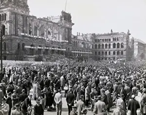 Massive Crowd Outside Large Building