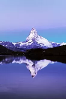 Images Dated 27th September 2014: Matterhorn reflected in lake Stellisee, at dusk, Valais Alps, Canton of Valais, Zermatt, Switzerland