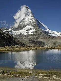 Images Dated 7th September 2015: Matterhorn reflected in Riffelsee, Zermatt, Valais Canton, Switzerland