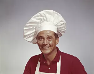 Images Dated 31st January 2017: Mature male chef smiling, portrait
