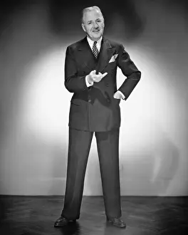 50 59 Years Prints: Mature man in full suit posing in studio, (B&W), portrait