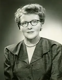 Well Groomed Prints: Mature woman in eyewear posing in studio, (B&W), (Close-up), (Portrait)