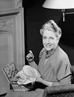Mature woman sewing