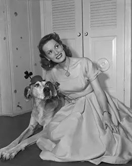 Maureen Ohara Prints: Maureen O'Hara is Looking Over a Three-Leaf Clover