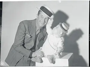 Playful Prints: Maurice Chevalier and Baby