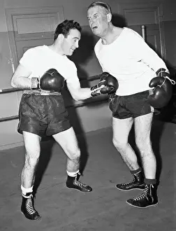 Punching Prints: Maurice Chevalier Punched in Midriff