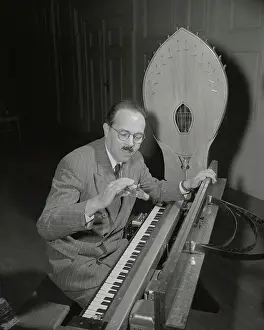 Keyboard Instrument Prints: Maurice Martenot Sitting at Musical Keyboard
