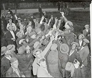 Fort Hunt Prints: Maurice Miller Giving Out Cigarettes