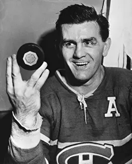 Maurice Richard Holding Puck