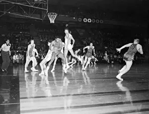 Maurice Stokes Fighting for the Basketball
