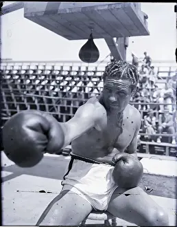 Punching Prints: Max Baer Punching at Camera