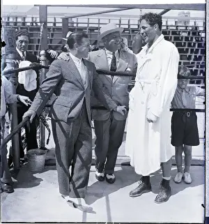 Max Baer Standing in Ring with Guests