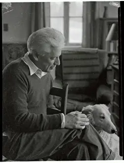 Max Forrester Eastman Sitting with his dog