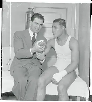 Max Schleming Showing Concern for Joe Louis