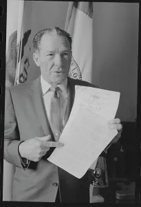 Pamphlet Prints: Mayor Samuel Yorty Displaying Handbills