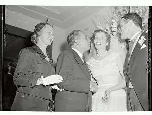 Vincent R Prints: Mayor Vincent Impellitteri Planting a Kiss on Mrs. Robert S. Shriver, Jr