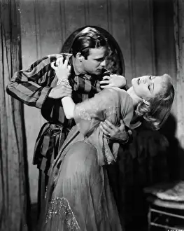 Prints of (Original Caption) 1951-Publicity handout of a movie still for the Warner Brothers picture A Streetcar Named Desire The Iconic Moments Captured: M.Brando Holds V.Leigh @Streetcar Named