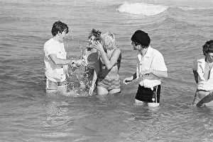 Splashing Prints: McCartney and Lennon Swimming With Girls