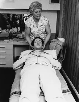 John McEnroe Prints: McEnroe With Osteopath