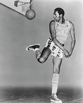 Meadowlark Lemon Throwing Basketball Backwards into Basket